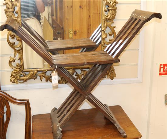 A teak folding campaign chair